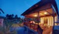 Tung's Tropika - with a wooden hut by a lake - Lahat - Malaysia Hotels