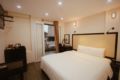 03-Private-Bedroom Street View With Balconies - Hanoi - Vietnam Hotels